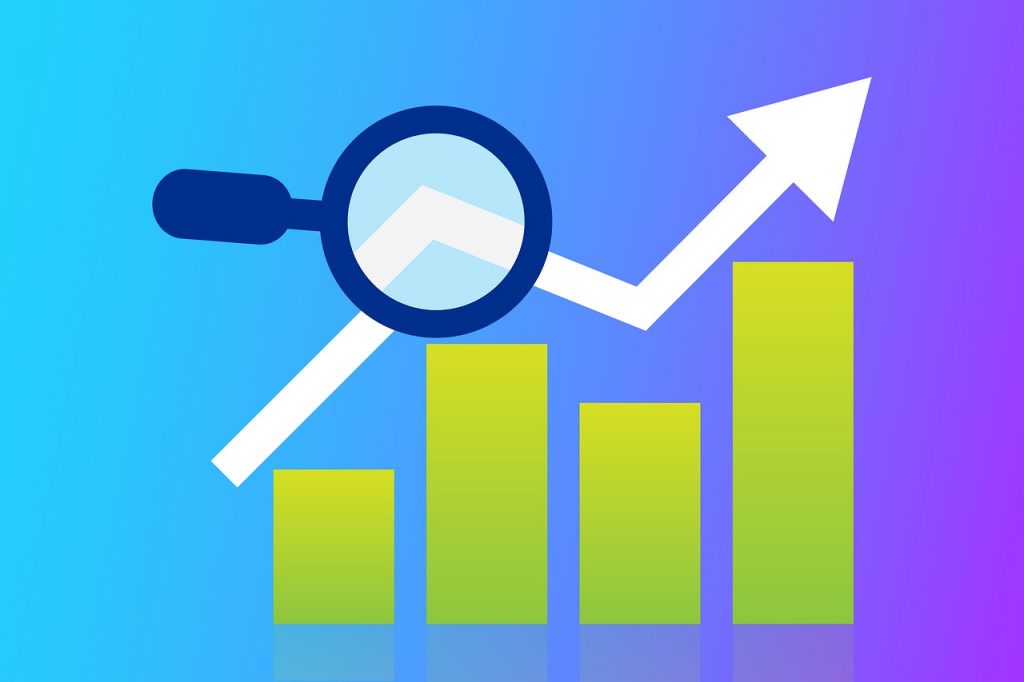 An ascending bar chart with a magnifying glass - AlikeAudience